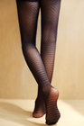 Ghette modellate di seta delle calze delle calzamaglia del ginocchio sexy del pizzo permeabili